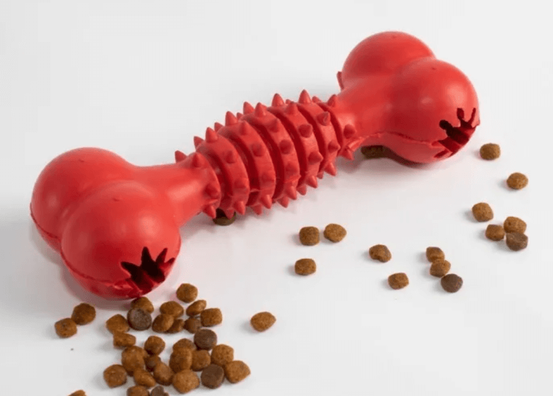 Ir a juguete para perro en forma de hueso. Material de goma con pinches, rellenable, super resistente, color rojo
